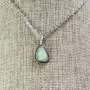 Artisan Made Iridescent Welo Opal Silver Pendant. Silent Wolf Jewelry